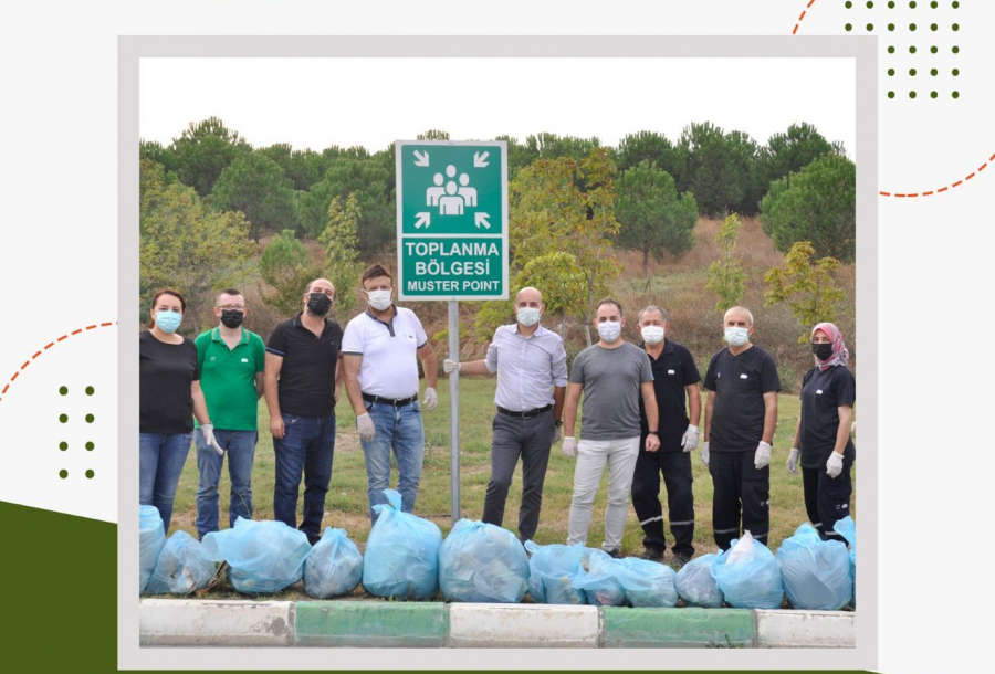 Umdasch Madosan team during World Cleanup Day event, gathering waste and scattering seed balls.